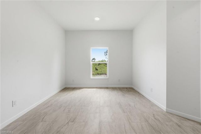 1018 Kent ST E, Lehigh Acres, FL 33971