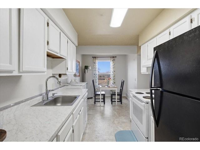 3121 S Tamarac Dr 302H, Denver, CO 80231