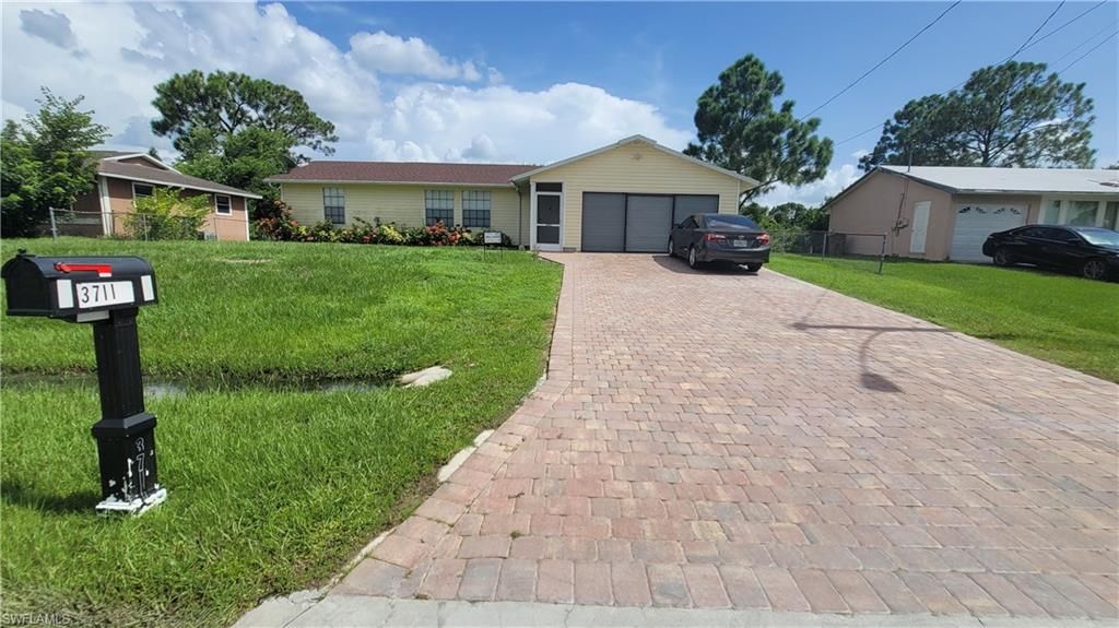 3711 10th ST SW, LEHIGH ACRES, FL 33976 — exterior