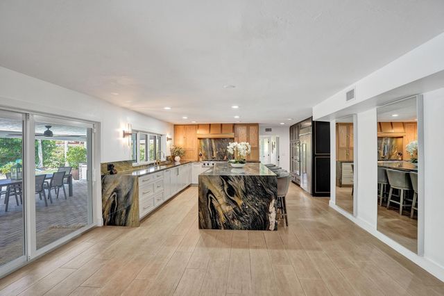 2 Mendota Lane, Sea Ranch Lakes, FL 33308