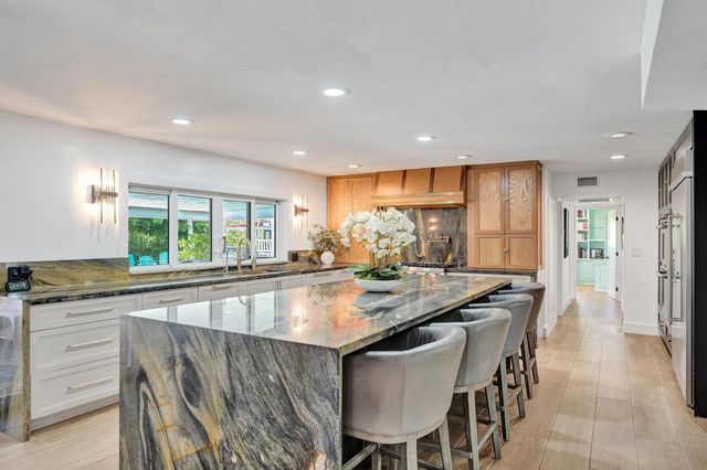 2 Mendota Lane, Sea Ranch Lakes, FL 33308