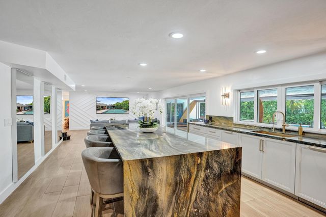 2 Mendota Lane, Sea Ranch Lakes, FL 33308