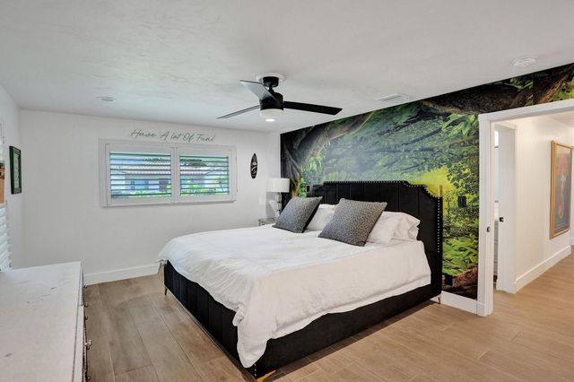 2 Mendota Lane, Sea Ranch Lakes, FL 33308