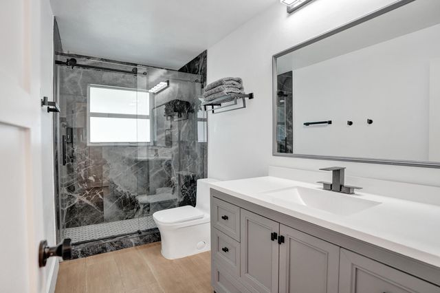 2 Mendota Lane, Sea Ranch Lakes, FL 33308