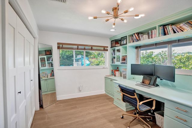 2 Mendota Lane, Sea Ranch Lakes, FL 33308