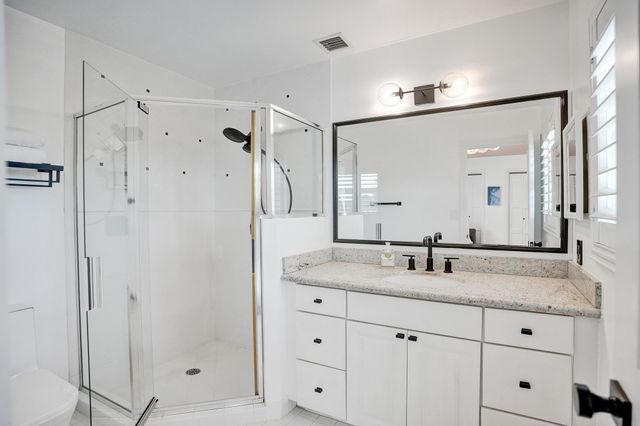 2 Mendota Lane, Sea Ranch Lakes, FL 33308
