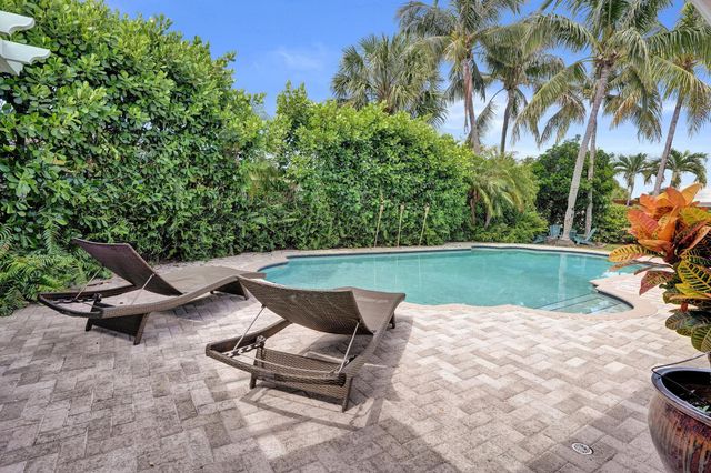 2 Mendota Lane, Sea Ranch Lakes, FL 33308