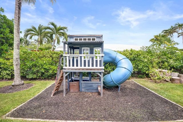 2 Mendota Lane, Sea Ranch Lakes, FL 33308