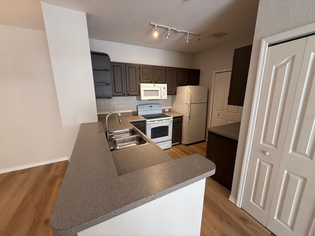 2537 MAITLAND CROSSING WAY 12-201, Orlando, FL 32810