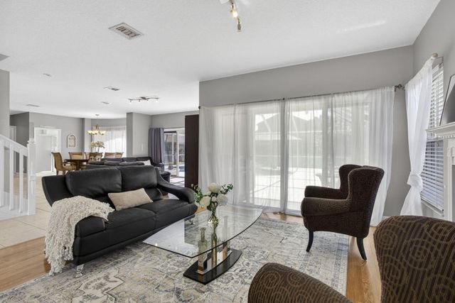 123 Fernwood Crescent, Royal Palm Beach, FL 33411