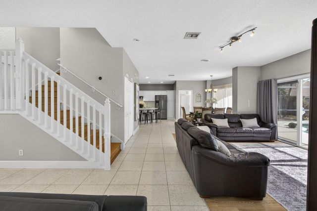 123 Fernwood Crescent, Royal Palm Beach, FL 33411