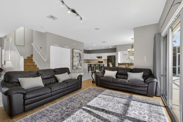 123 Fernwood Crescent, Royal Palm Beach, FL 33411