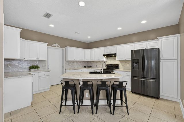 123 Fernwood Crescent, Royal Palm Beach, FL 33411