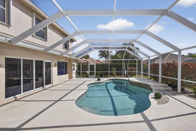 123 Fernwood Crescent, Royal Palm Beach, FL 33411