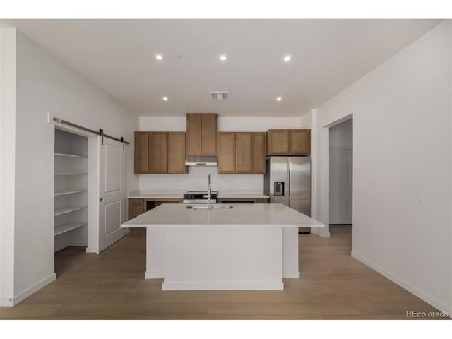 6153 N Ceylon St 3-106, Denver, CO 80249