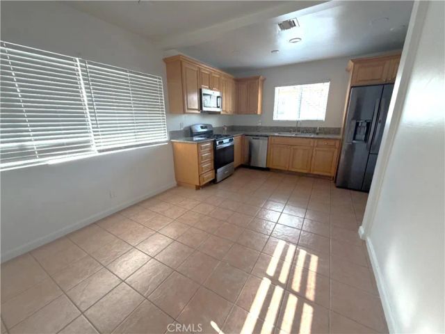 11148 S Wilton Place, Los Angeles, CA 90047