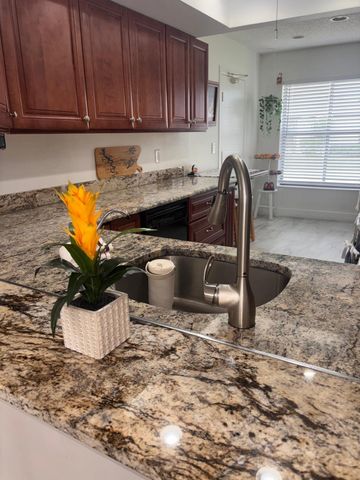 6285 Tall Cypress Circle, Greenacres, FL 33463