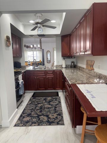6285 Tall Cypress Circle, Greenacres, FL 33463