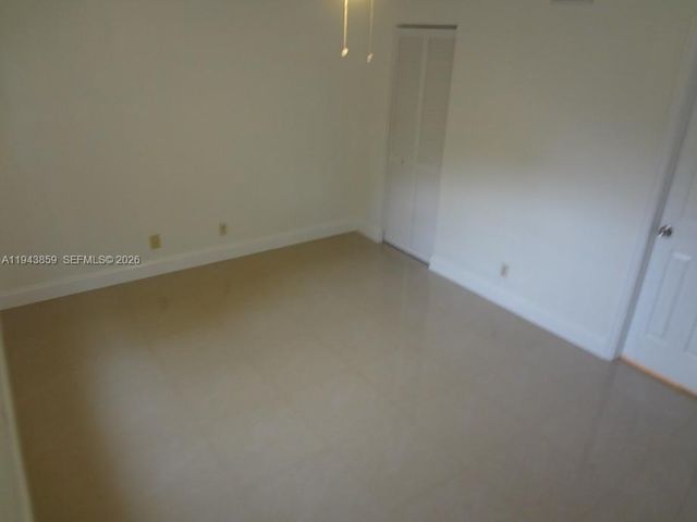 10125 W Sunrise Blvd 104, Plantation, FL 33322