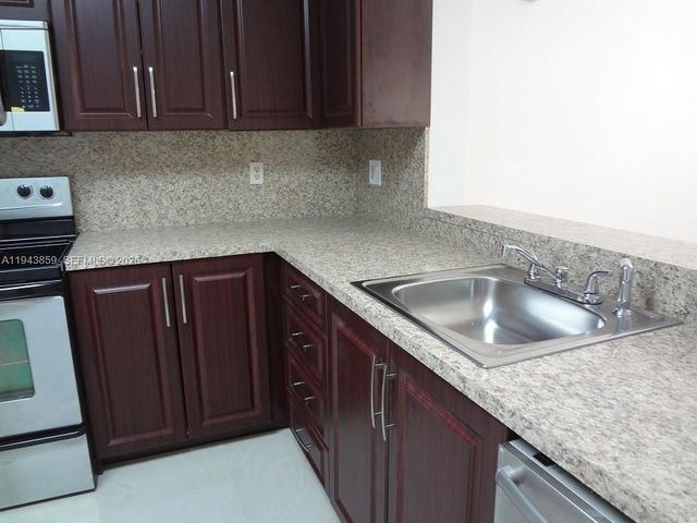 10125 W Sunrise Blvd 104, Plantation, FL 33322