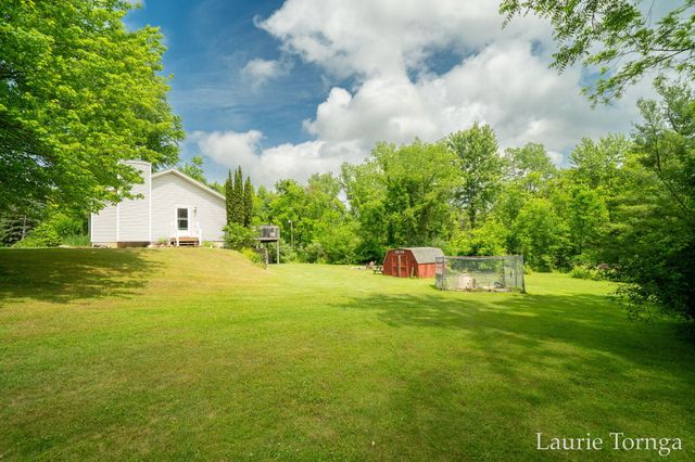 2670 Grand River Drive Ne, Ada Twp, MI 49525