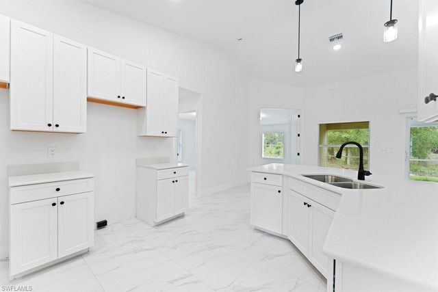 1042 Cheney AVE S, Lehigh Acres, FL 33974