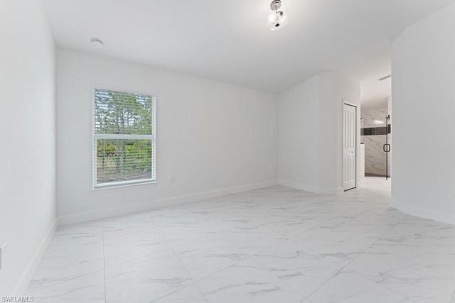 1042 Cheney AVE S, Lehigh Acres, FL 33974