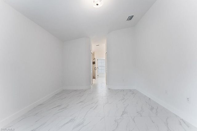 1042 Cheney AVE S, Lehigh Acres, FL 33974