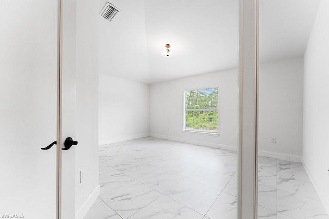 1042 Cheney AVE S, Lehigh Acres, FL 33974