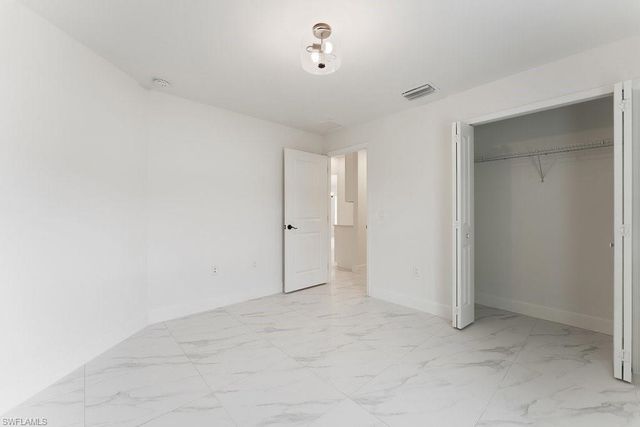 1042 Cheney AVE S, Lehigh Acres, FL 33974