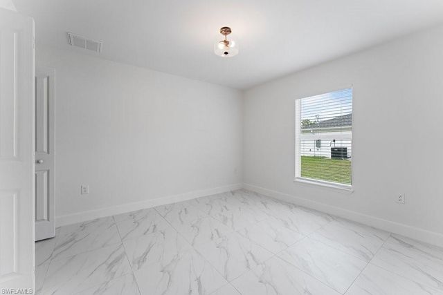 1042 Cheney AVE S, Lehigh Acres, FL 33974