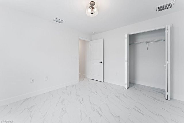 1042 Cheney AVE S, Lehigh Acres, FL 33974