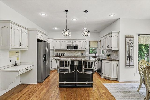 1915 NW WILDWOOD Court, Blue Springs, MO 64015