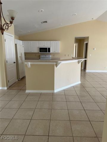 1401 N Gator CIR, Cape Coral, FL 33909