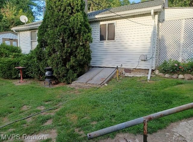 1721 Moffat Road, Leonard, MI 48367