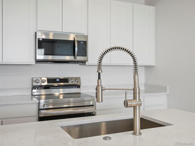 6153 N Ceylon Street 307, Denver, CO 80249