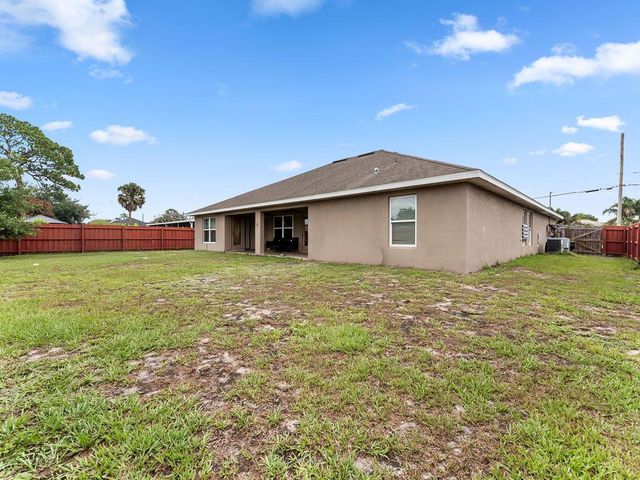 3644 SW Ballweg Street, Port St. Lucie, FL 34953