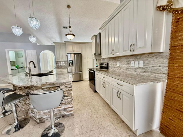 125 SW Donna Terrace, Port St. Lucie, Port St Lucie, FL 34984