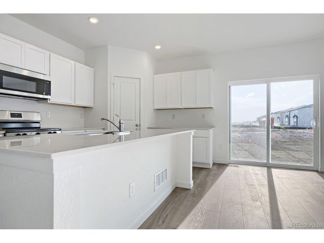 385 Wildflower Ct, Bennett, CO 80102
