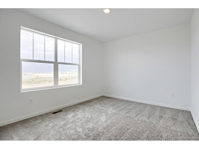 385 Wildflower Ct, Bennett, CO 80102