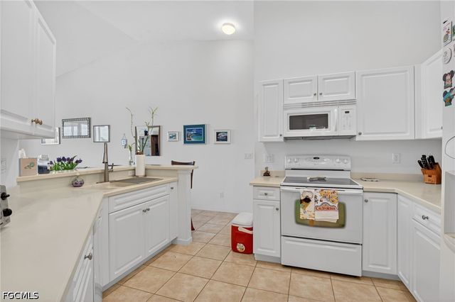 25009 Peacock LN 1-201, Naples, FL 34114