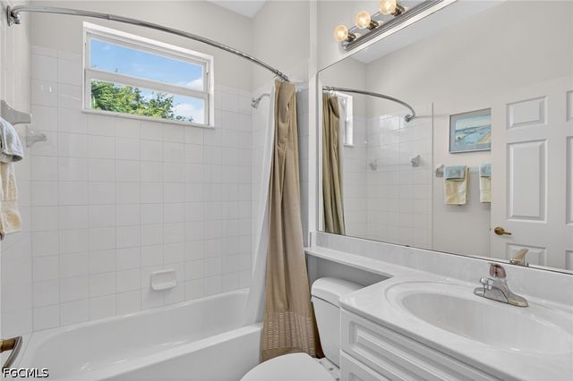 25009 Peacock LN 1-201, Naples, FL 34114