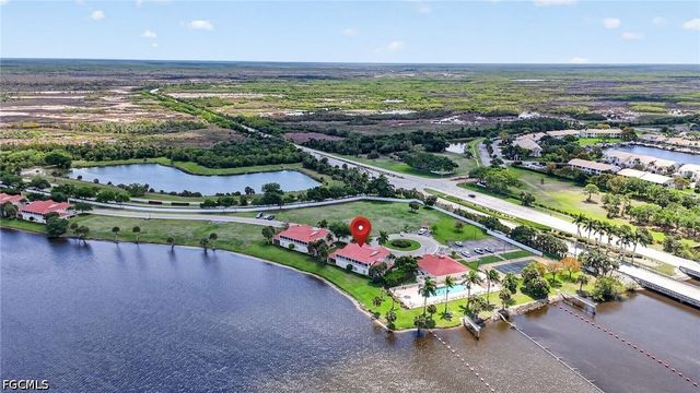 25009 Peacock LN 1-201, Naples, FL 34114