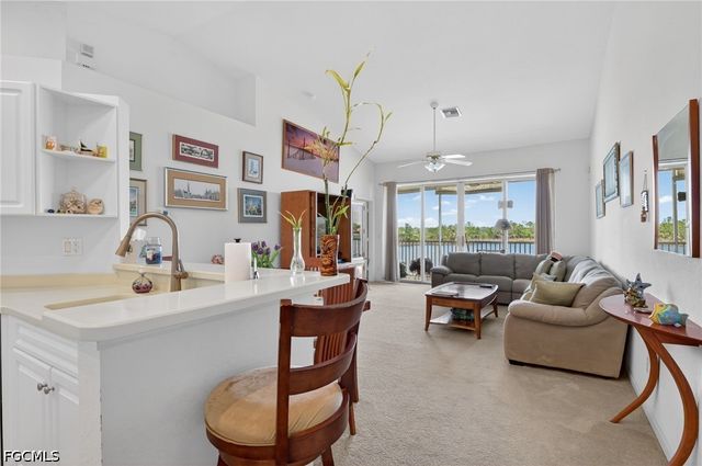 25009 Peacock LN 1-201, Naples, FL 34114