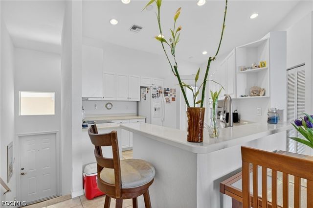 25009 Peacock LN 1-201, Naples, FL 34114