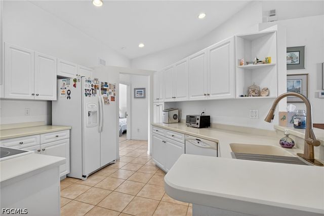 25009 Peacock LN 1-201, Naples, FL 34114