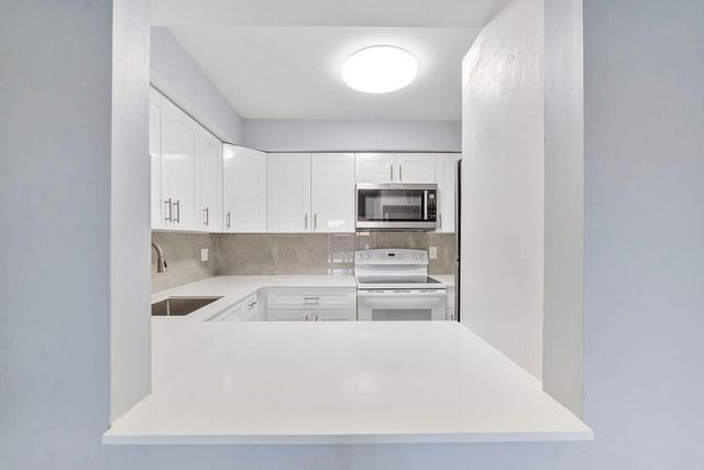 9960 Pineapple Tree Drive 107, Boynton Beach, FL 33436