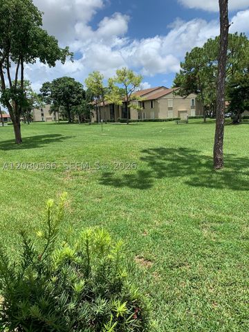 702 Sunny Pine Way A1, Green Acres, FL 33415