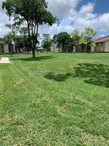 702 Sunny Pine Way A1, Green Acres, FL 33415