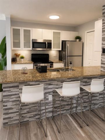 5463 VINELAND ROAD 5203, Orlando, FL 32811